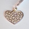 Złota zawieszka - ażurowe serce. Złoto próby 585. AMNE001